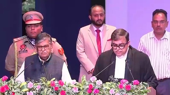 Justice Ashwani Kumar Mishra taking oath as Chief Justice of the Punjab and Haryana High Court.