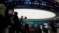 Asian Markets Hold Steady Ahead of Fed Decision as Oil Slips and Treasury Yield Falls Below 5%