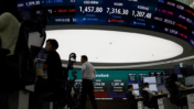 Asian Markets Hold Steady Ahead of Fed Decision as Oil Slips and Treasury Yield Falls Below 5%