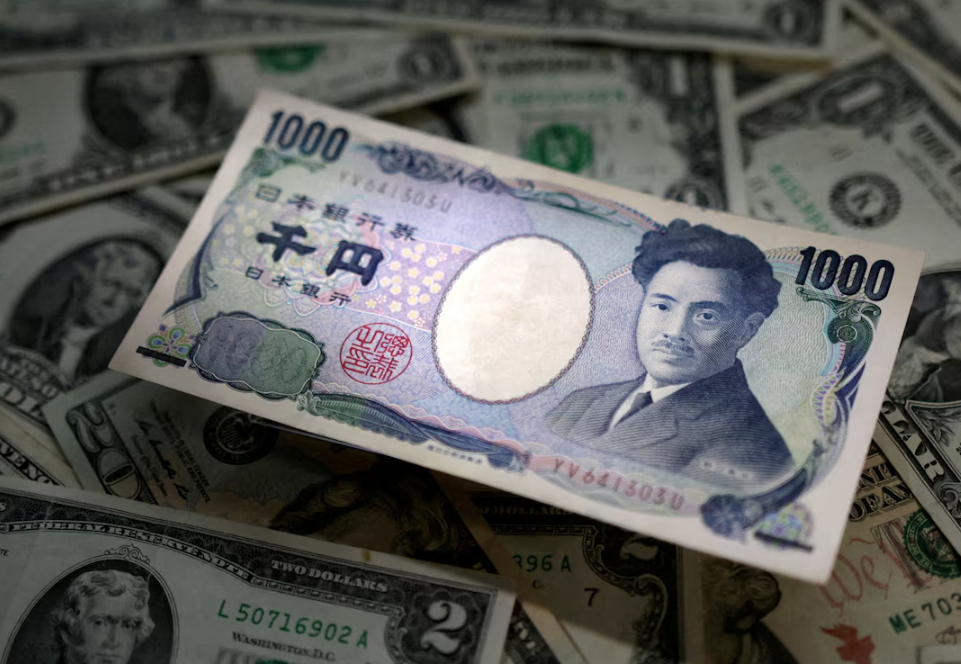 Japanese Yen Falls as Japan Vows Orderly Currency Moves After Fed Rate Hike