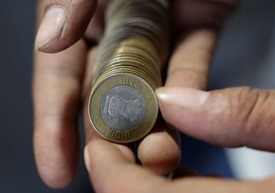 Indian Rupee Falls Past 96 as Oil Prices Rise